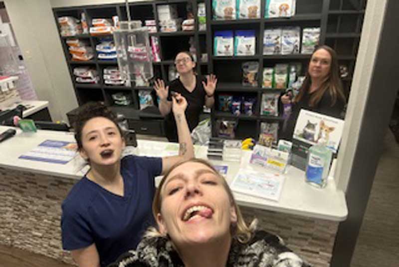 Staff making silly faces